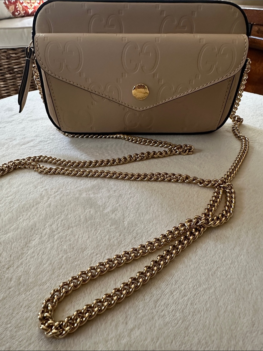 GUCCI Beige Embossed Crossbody Bag with Gold Chain Strap NEVER USED.